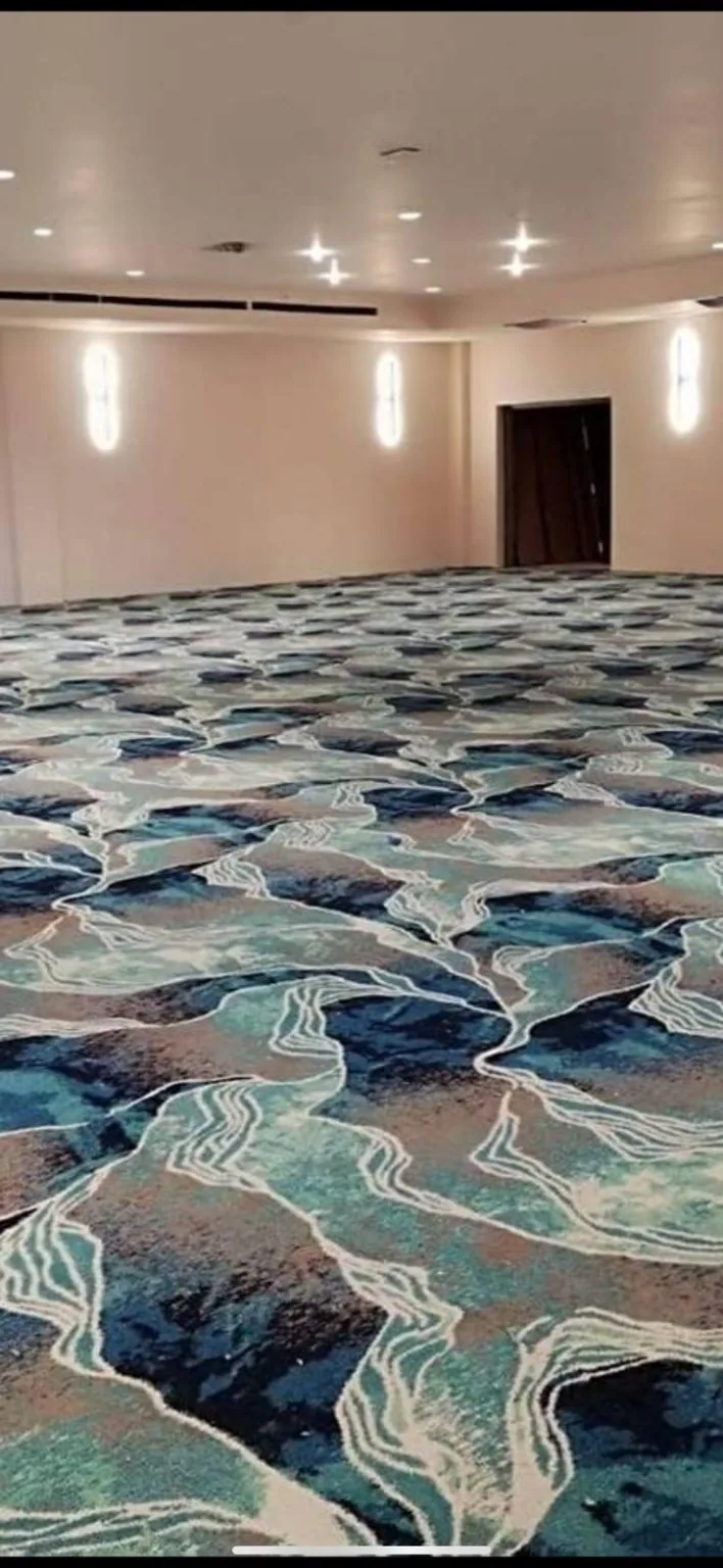 Blue patterned commercial carpet installation