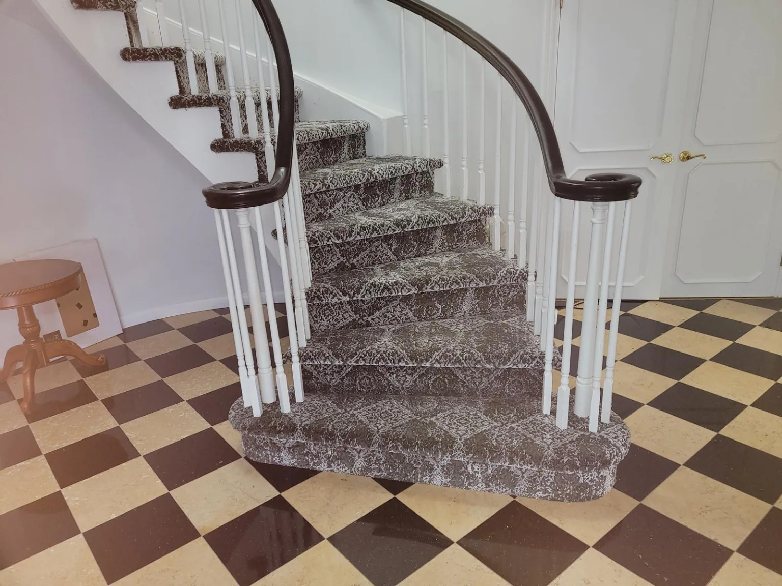 Custom patterned carpet detail and checkerboard floor